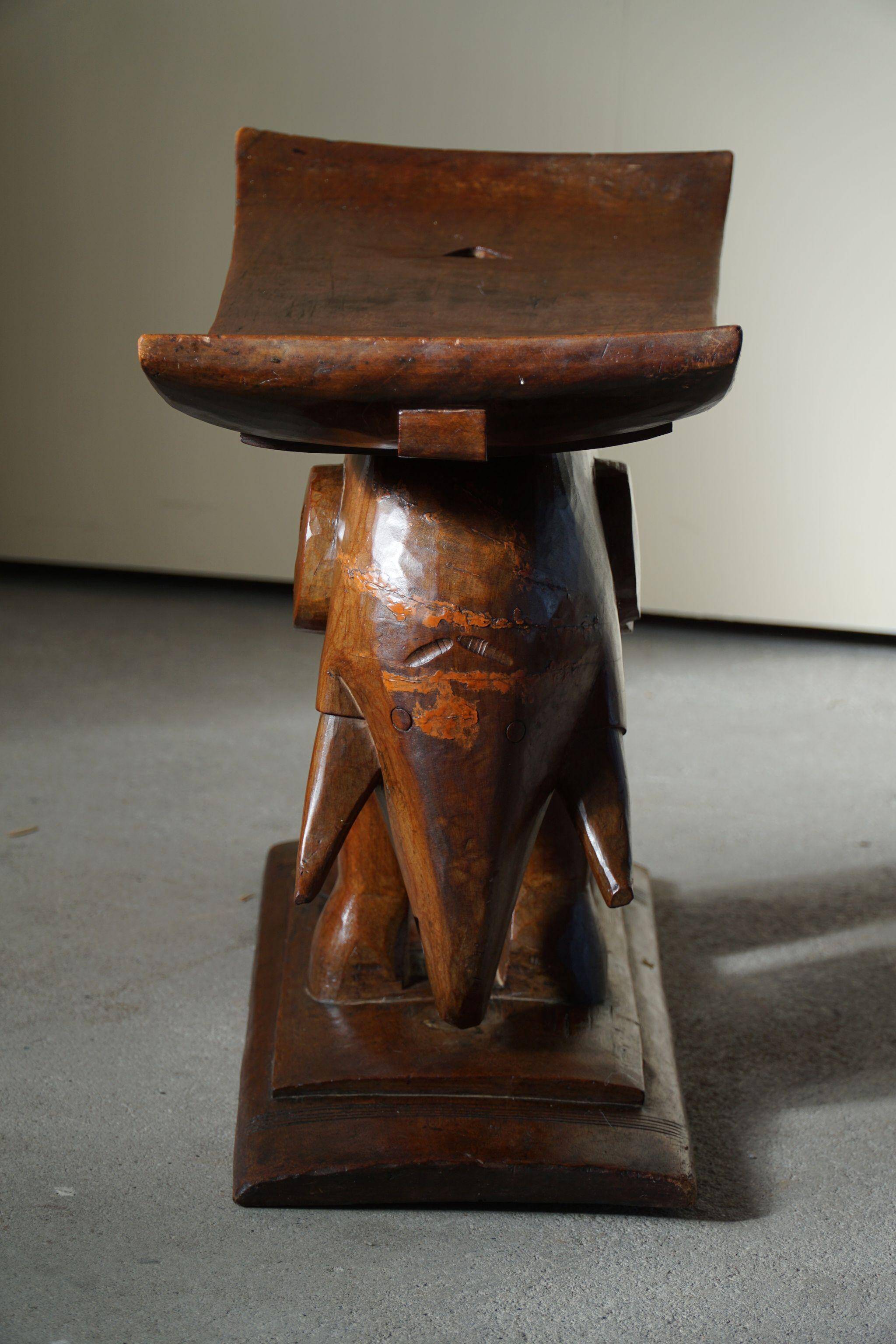 African elephant stool in carved wood, mid-century in Wabi Sabi style, 1940s.