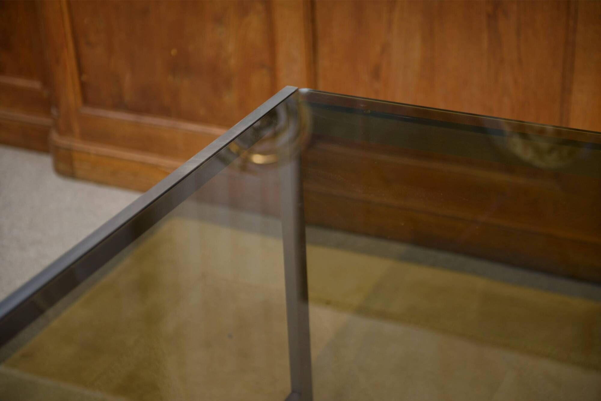 Brushed stainless steel and smoked black glass desk from the 1980s.