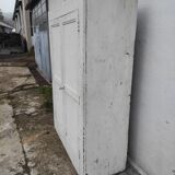 Old rustic Parisian wardrobe patinated white in oak and fir