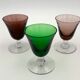 Nine vintage liquor glasses, coloured glass 20th century