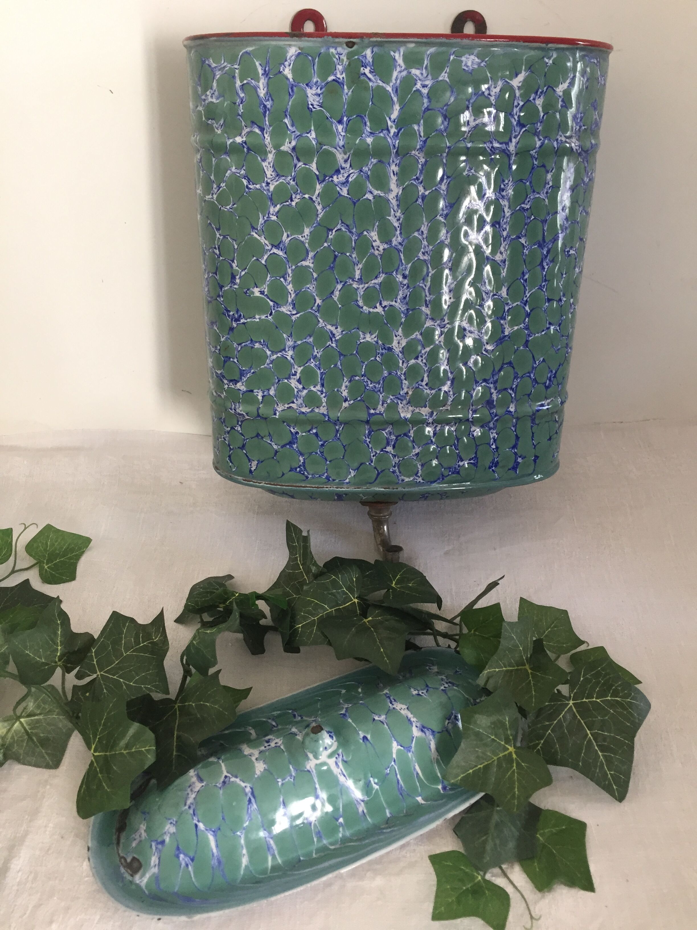 Old enamelled sheet metal wall fountain