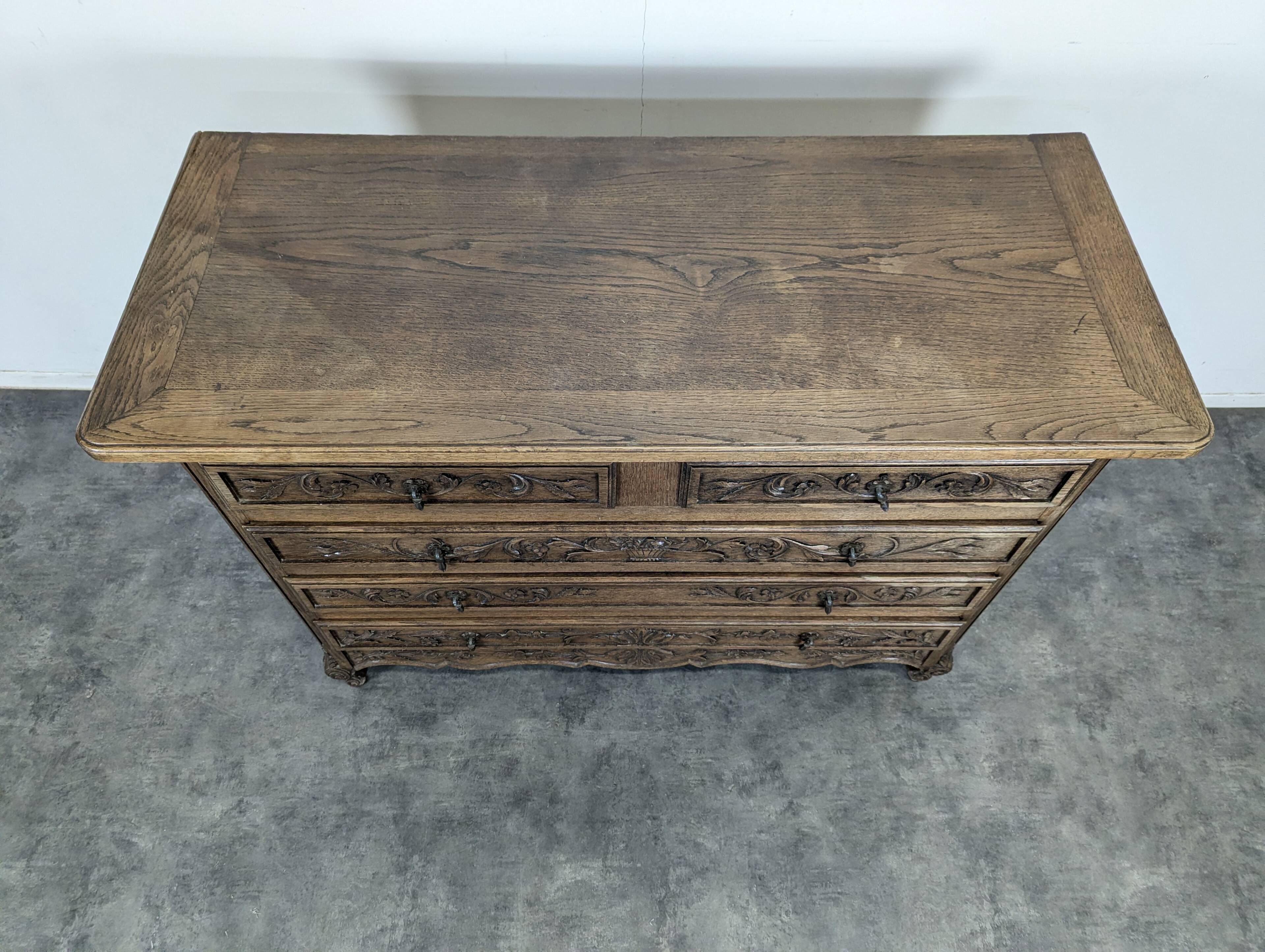 Carved neo-rustic commode in Norman style