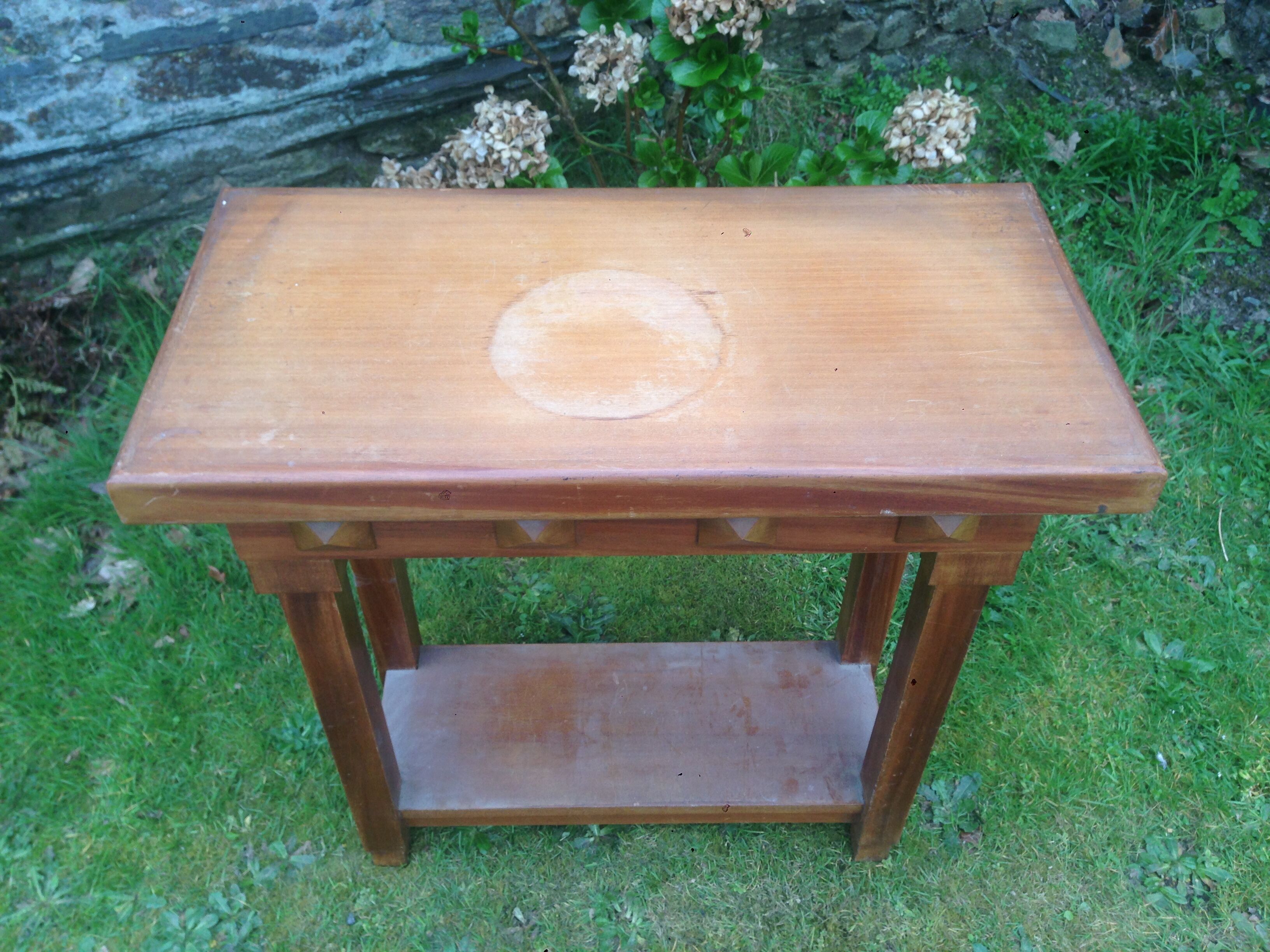 Art deco console in solid mahogany with diamond tips.