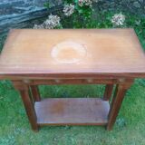 Art deco console in solid mahogany with diamond tips.