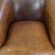 Characterful sheepskin leather club armchair with a luxurious, rustic appearance