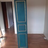 Glass cabinet in green patinated wood