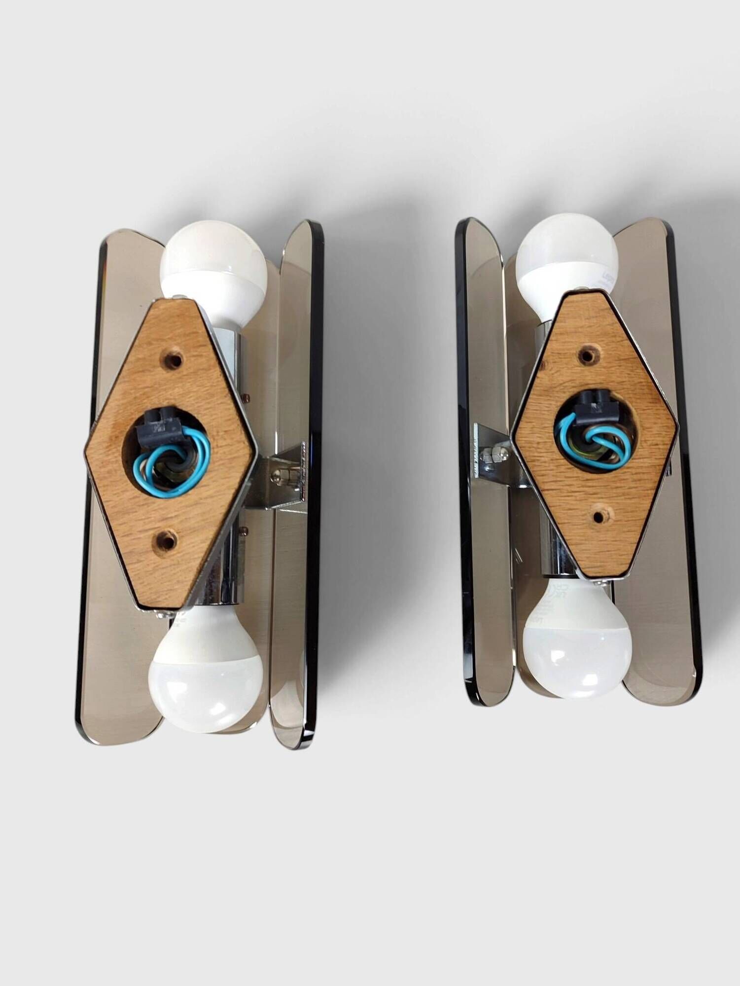 Pair of smoked glass and chrome wall lights attributed to Fontana Arte – Years