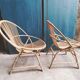 Paire de fauteuils coquille en rotin vintage 1960
