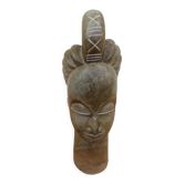 African woman sculpture in stone