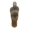 African woman sculpture in stone