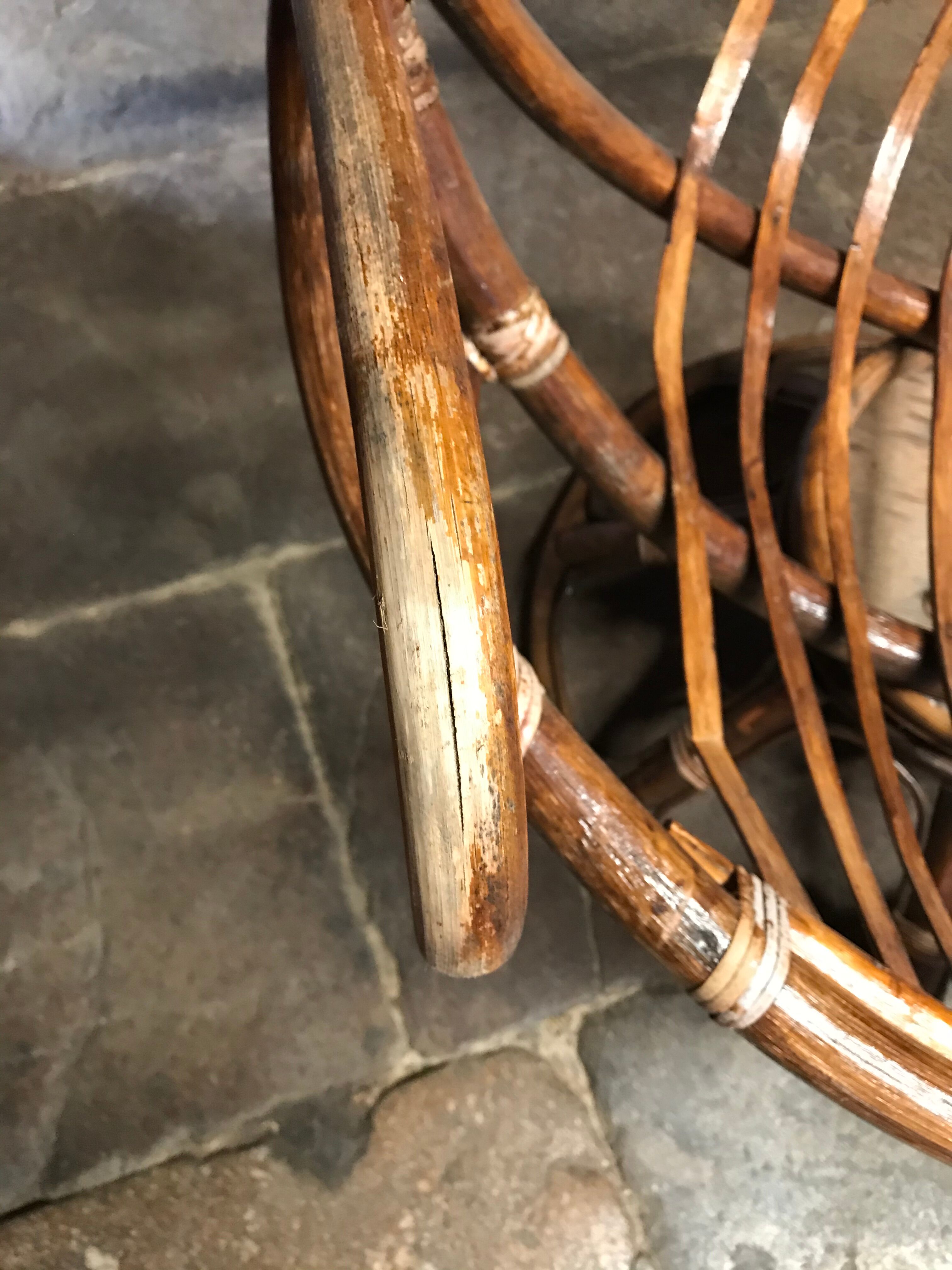 Swivel rattan armchair