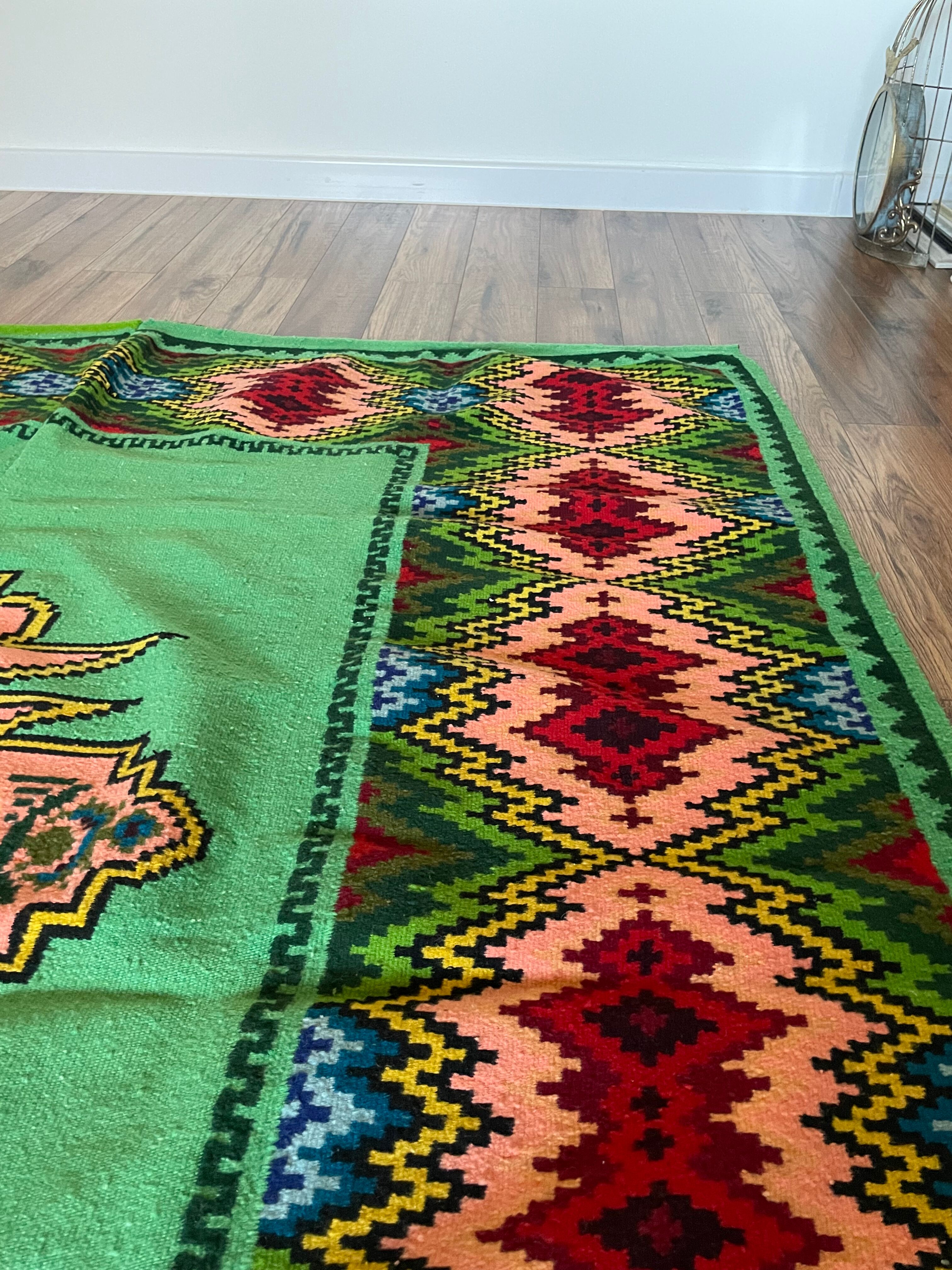 Romanian flatwoven rug geometrical design on a green turquoise background, 158x185 cm