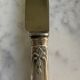 12 silver-plated metal knives. levert silversmith