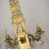 Two bronze and cut glass wall-mounted chandeliers