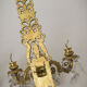 Two bronze and cut glass wall-mounted chandeliers