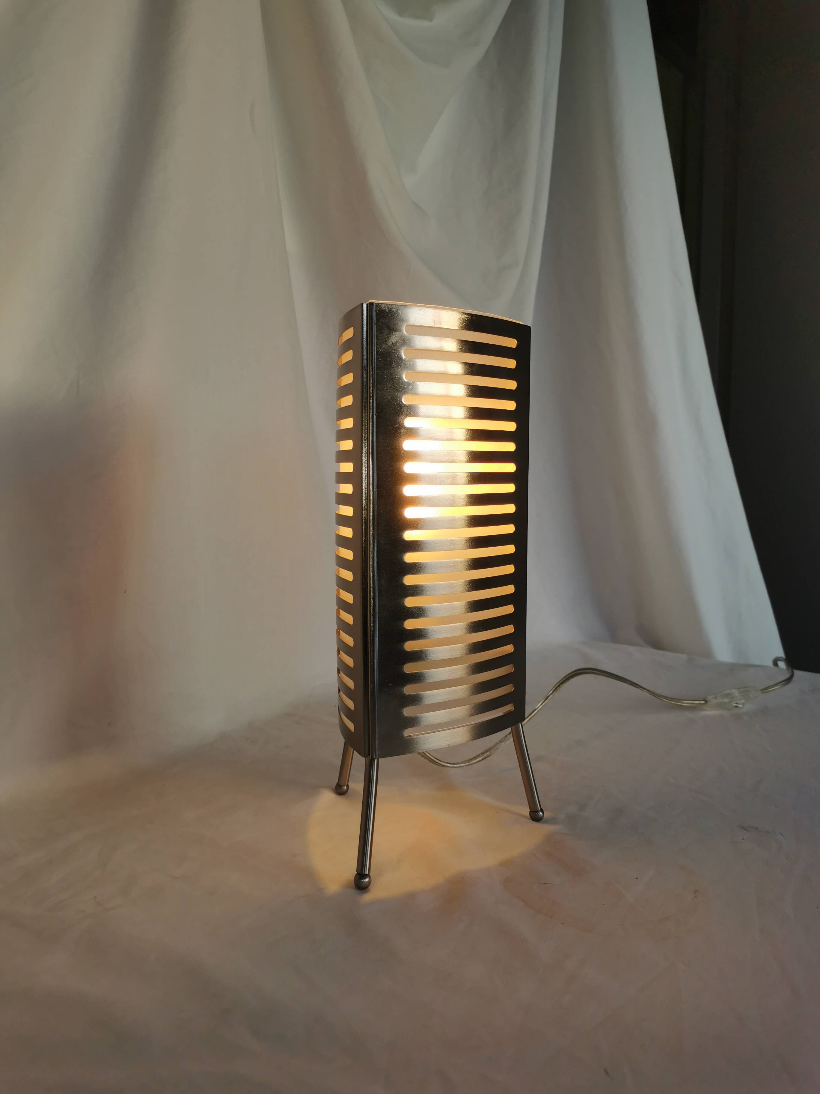 Openwork stainless steel table lamp, Sweden, 1990
