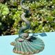 Antique candlestick base – stylised marine fish in patinated bronze