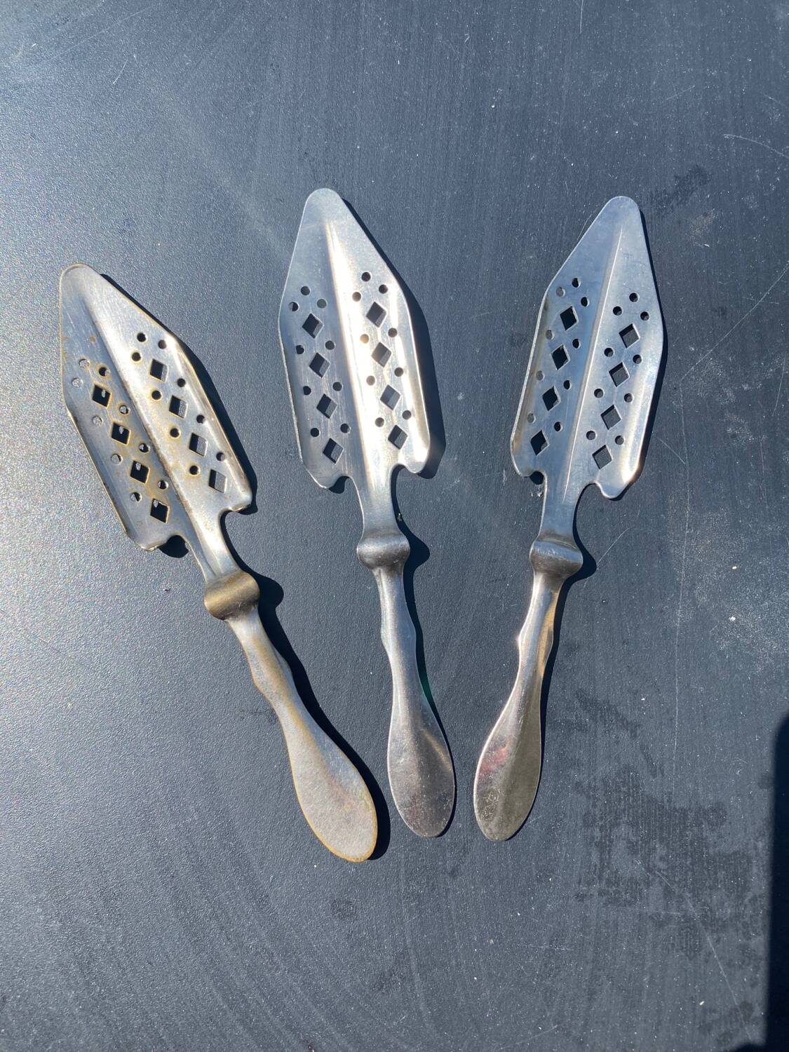 Lot 3 - Chiseled absinthe spoons