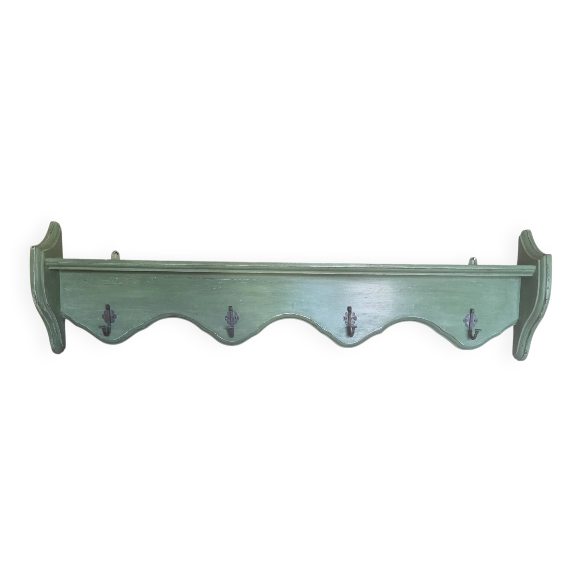 Antique wall shelf with a green patina