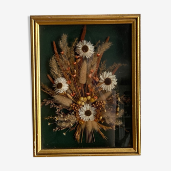 Showcase frame with bouquet of dried flowers