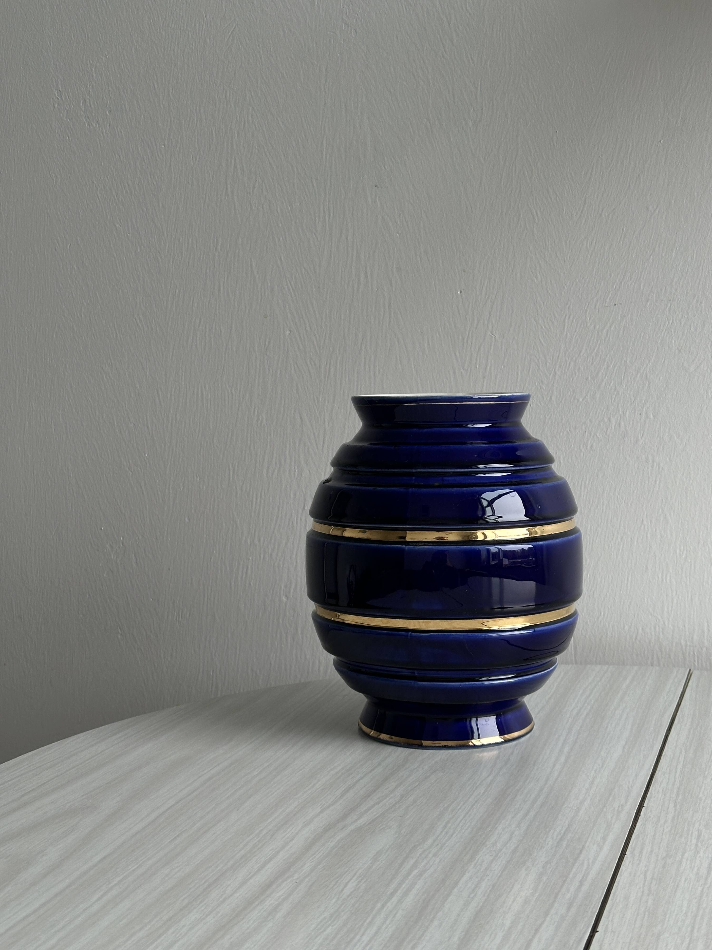 Vintage vase in shiny cobalt blue ceramic, gold edging