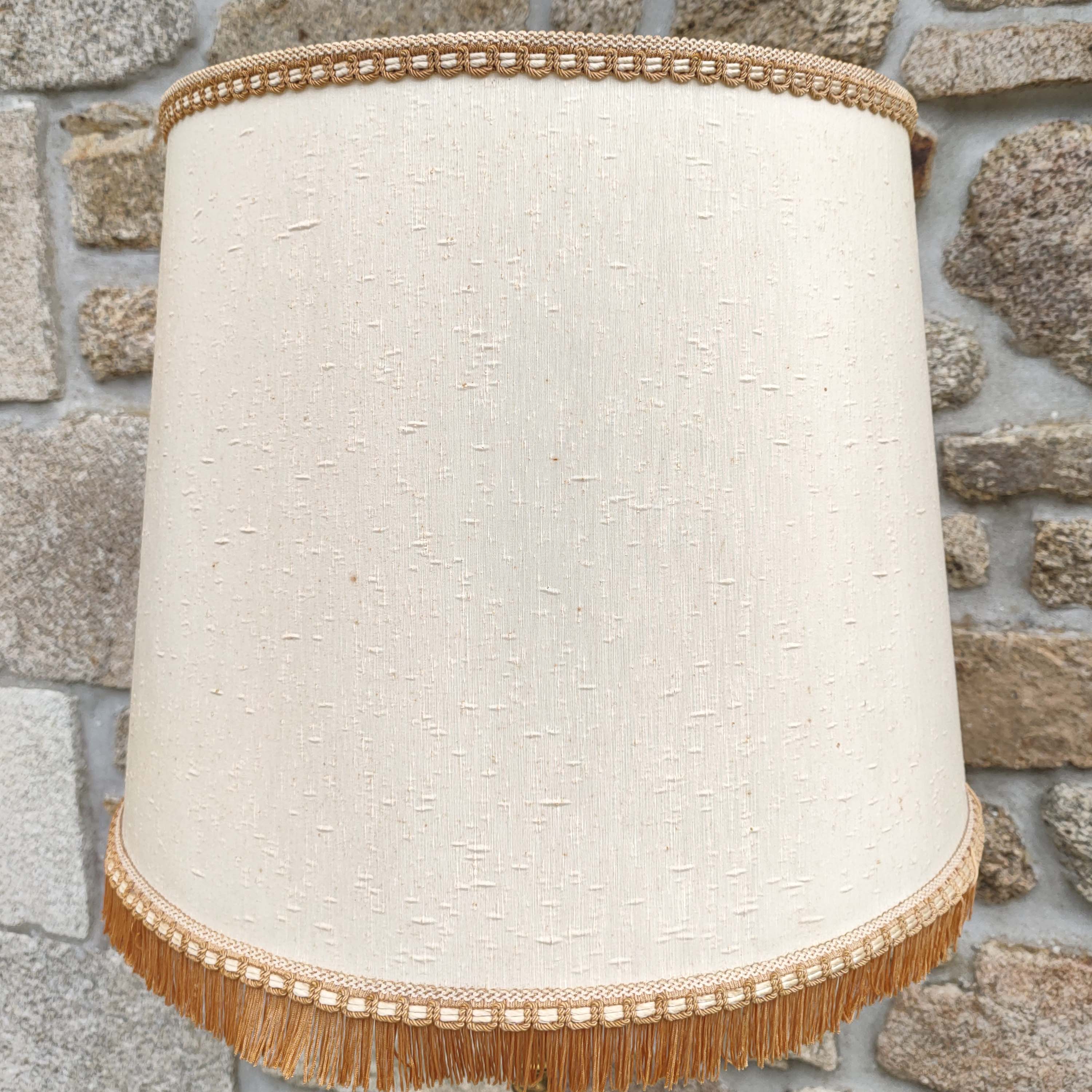 Tripod golden floor lamp