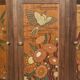 Buffet ou armoire d'angle, à 3 faces, en bois massif, sculpté et peint.
