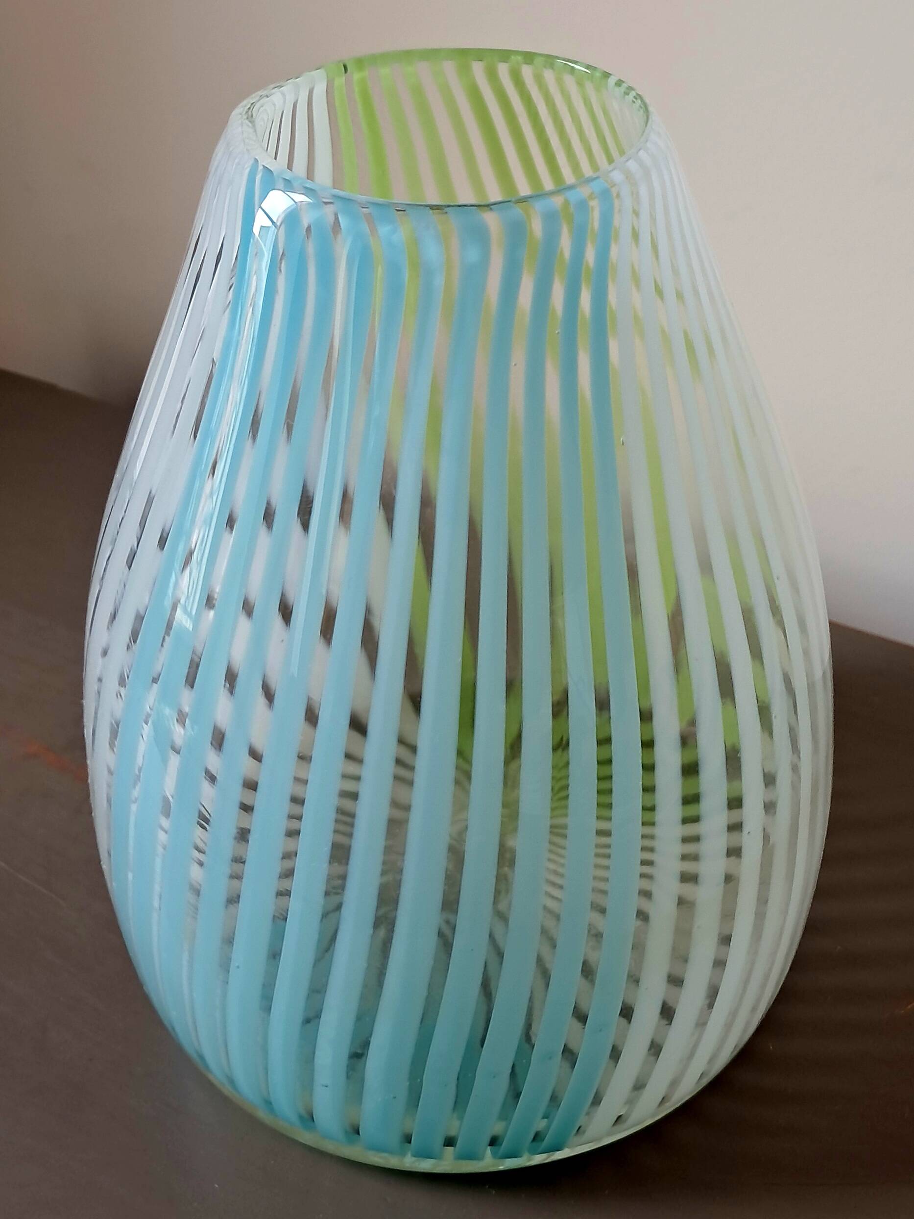 Blown glass vase with opal glass threads