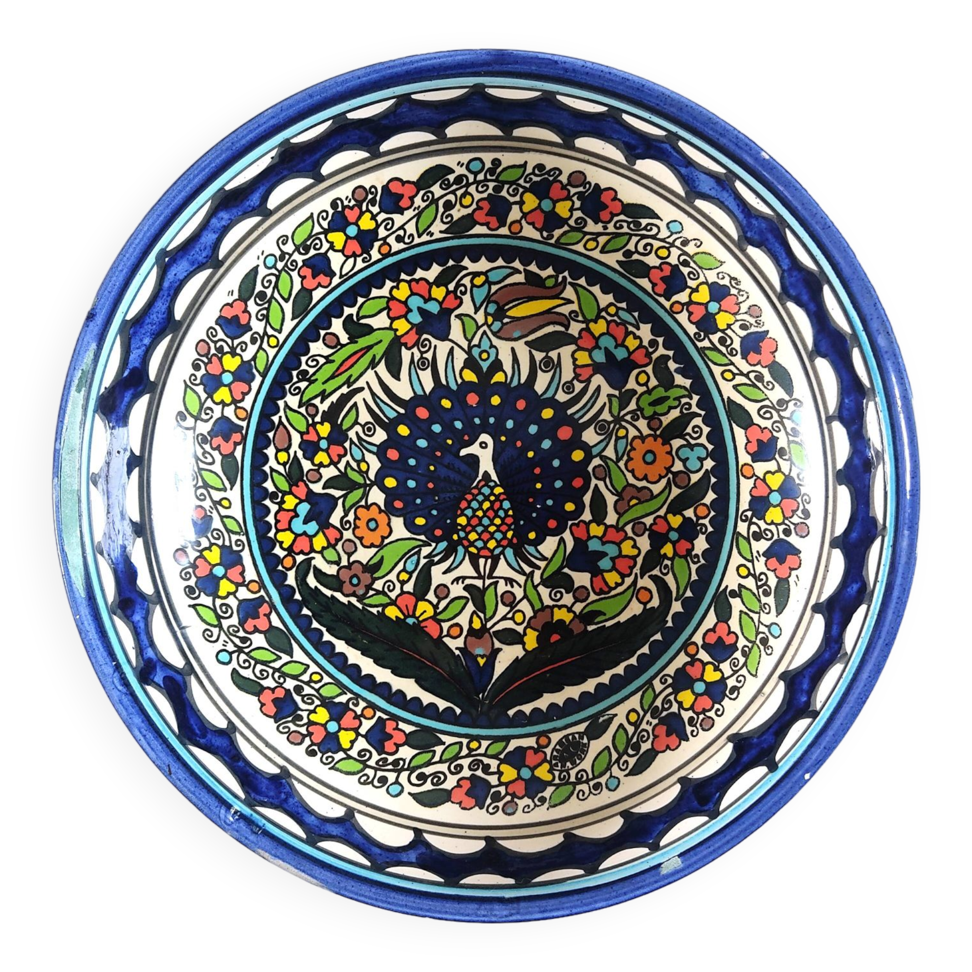 Large decorative dish with colorful peacock