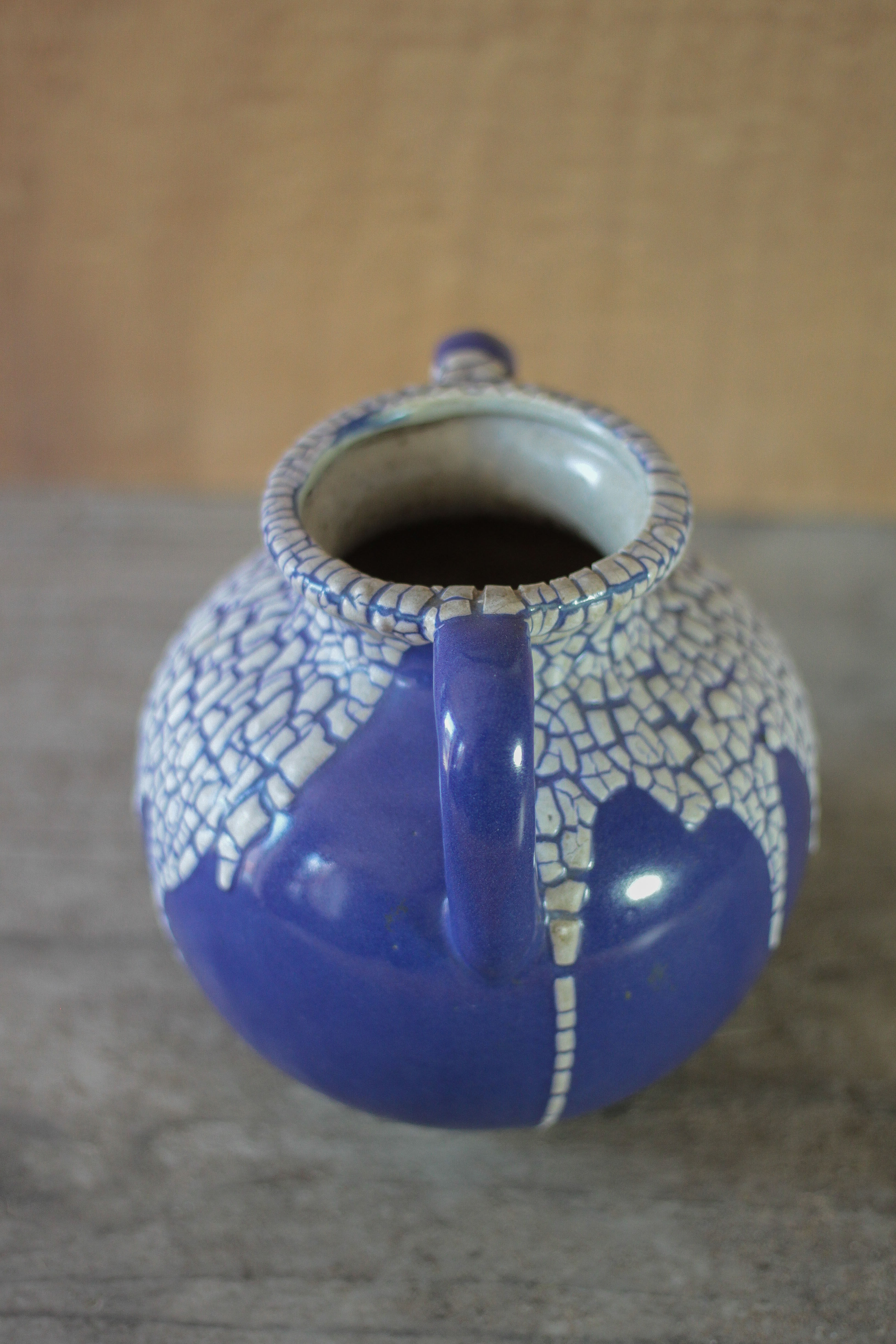 Vase signed Léon Pointu, ceramic vase with a glazed snake skin effect.