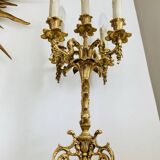 Pair of gilded bronze candlesticks, marble bases.