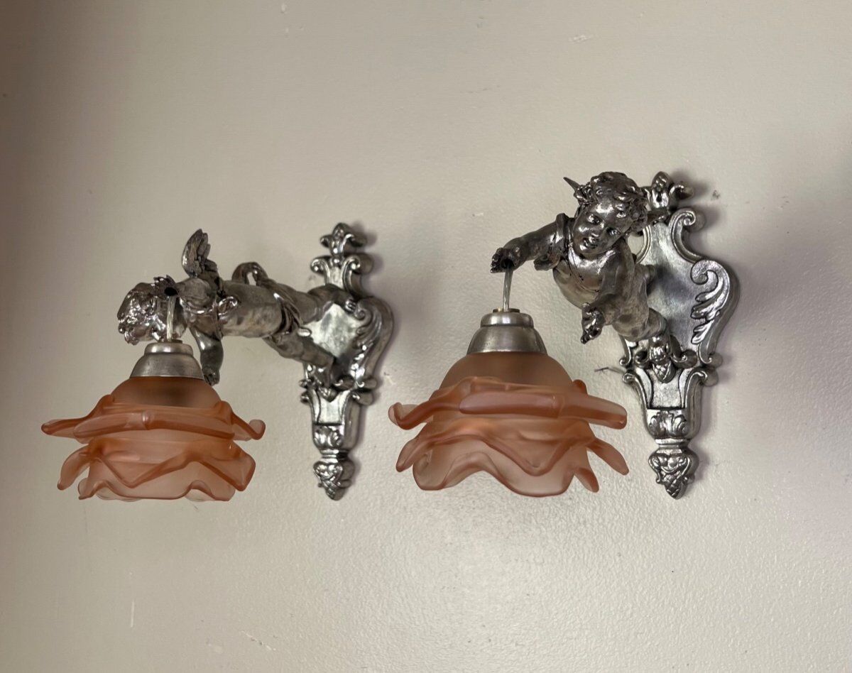 Pair of wall sconces, cherubs, angels, silvered