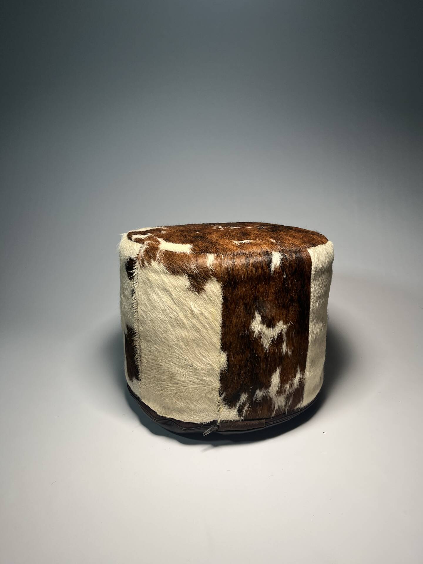 Vintage cowhide pouf from the 80s.