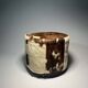 Vintage cowhide pouf from the 80s.