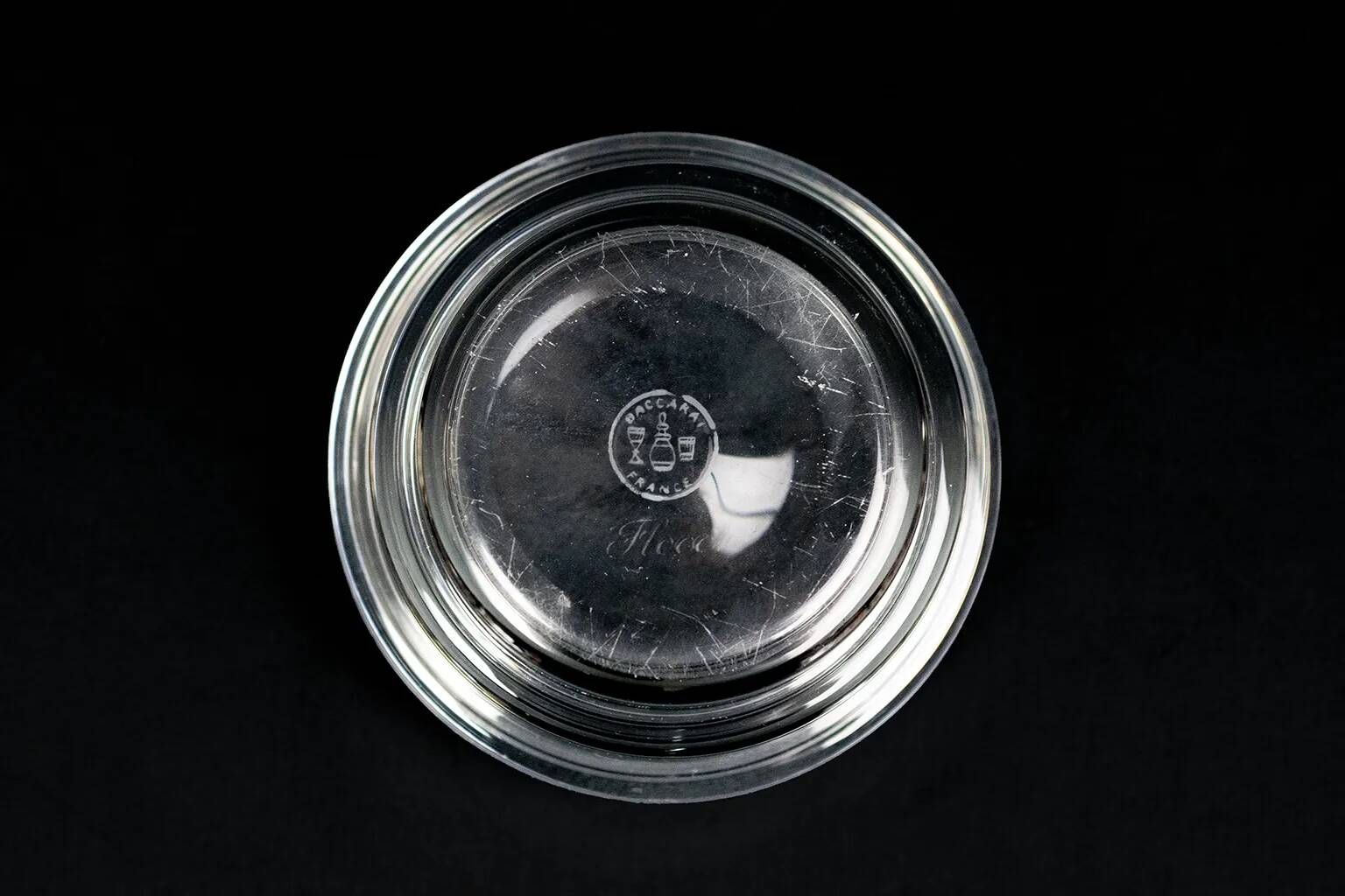 Baccarat crystal dish with wavy profile, acid-etched mark.