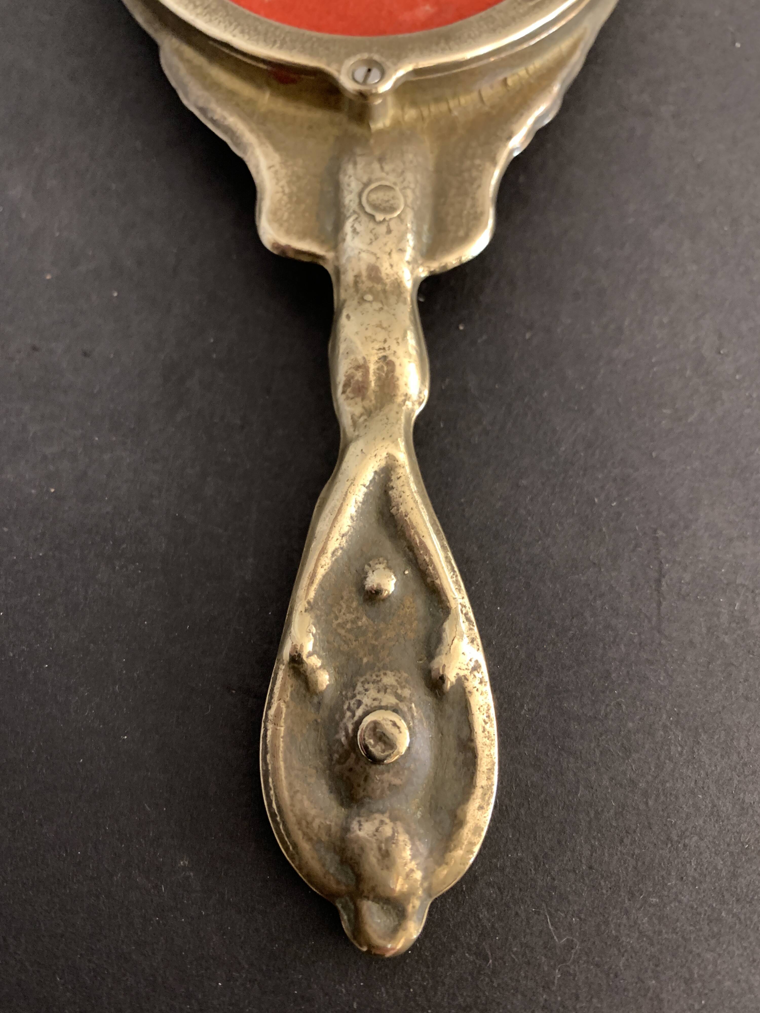 Bronze hand-facing mirror, early twentieth century, Louis XV style, 29 x 13 cm