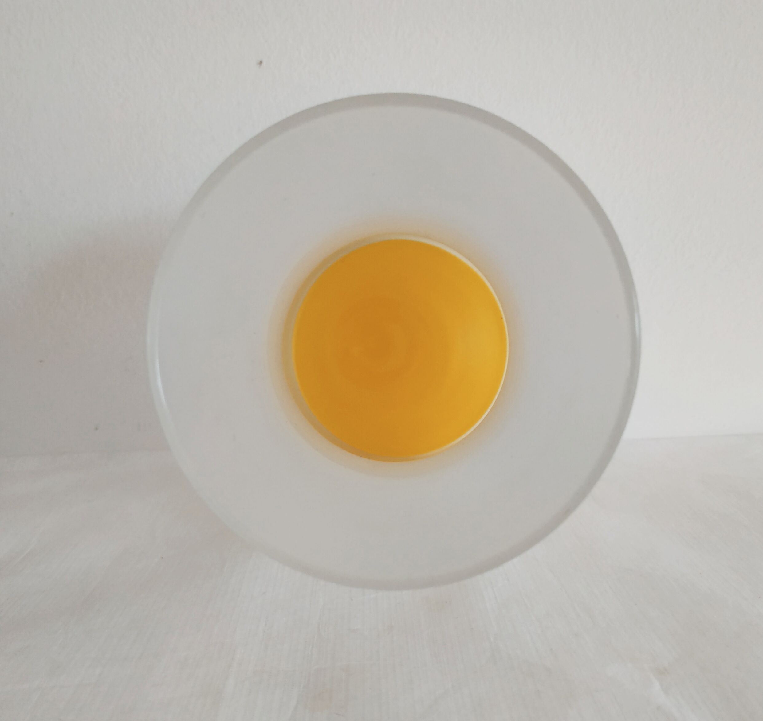 Frosted glass carafe with yellow bottom