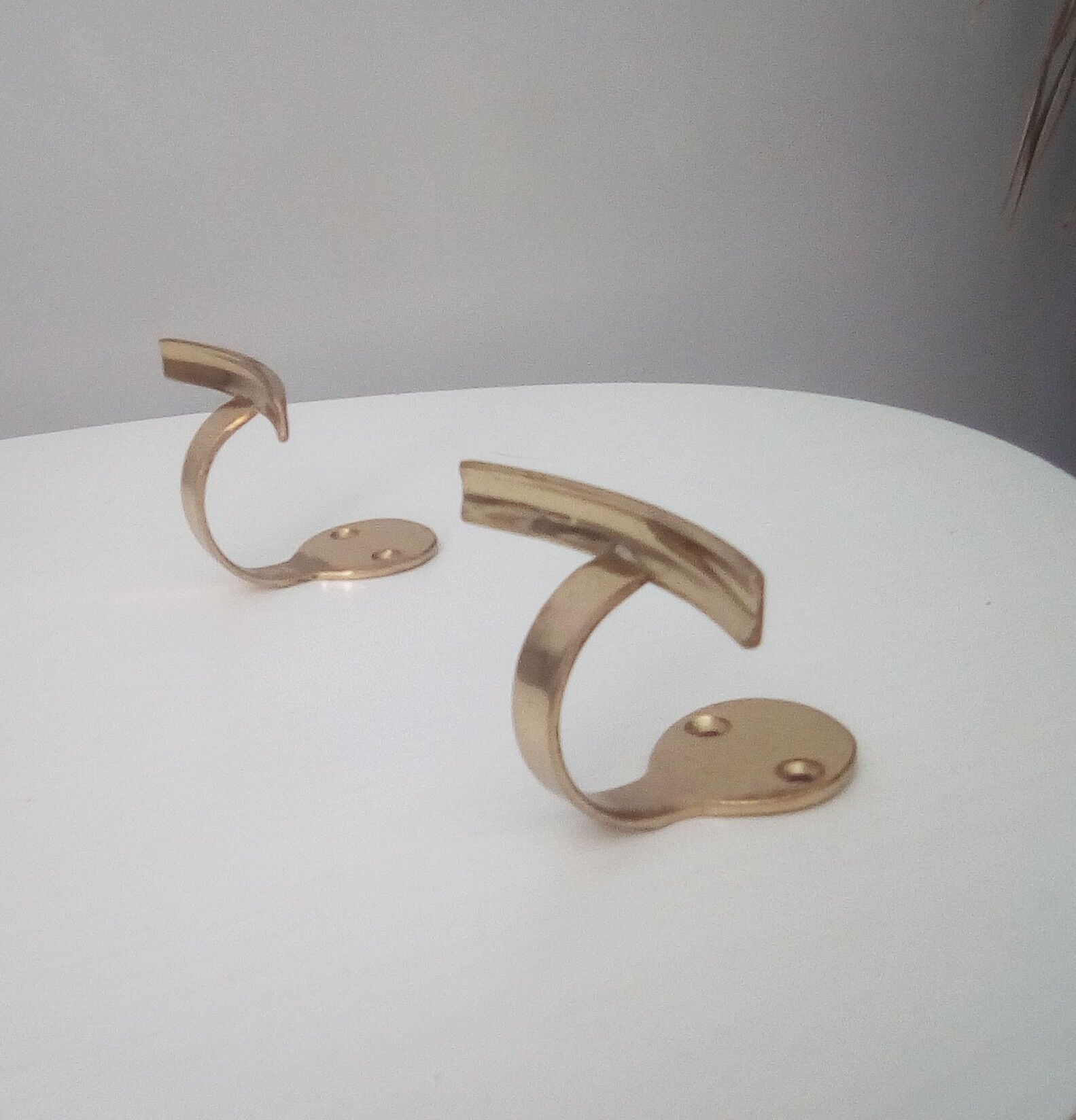 Pair of coat racks in gilded steel 70s/80s