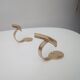 Pair of coat racks in gilded steel 70s/80s