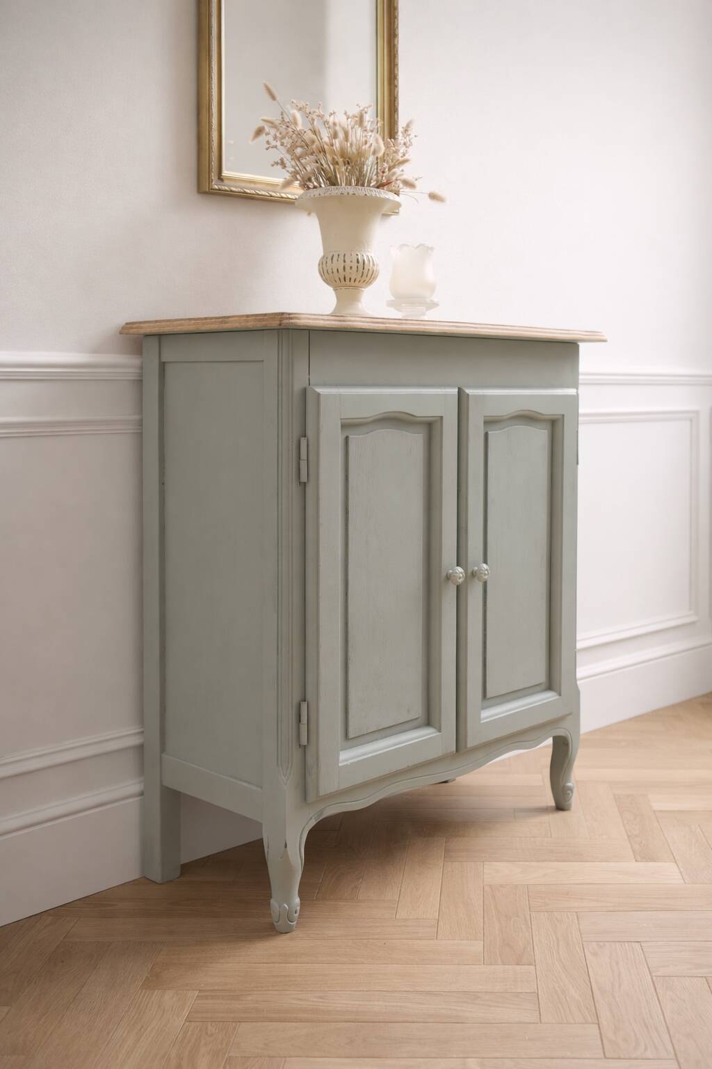 Small vintage piece of furniture with a shallow depth, re-enchanted in grey-green.