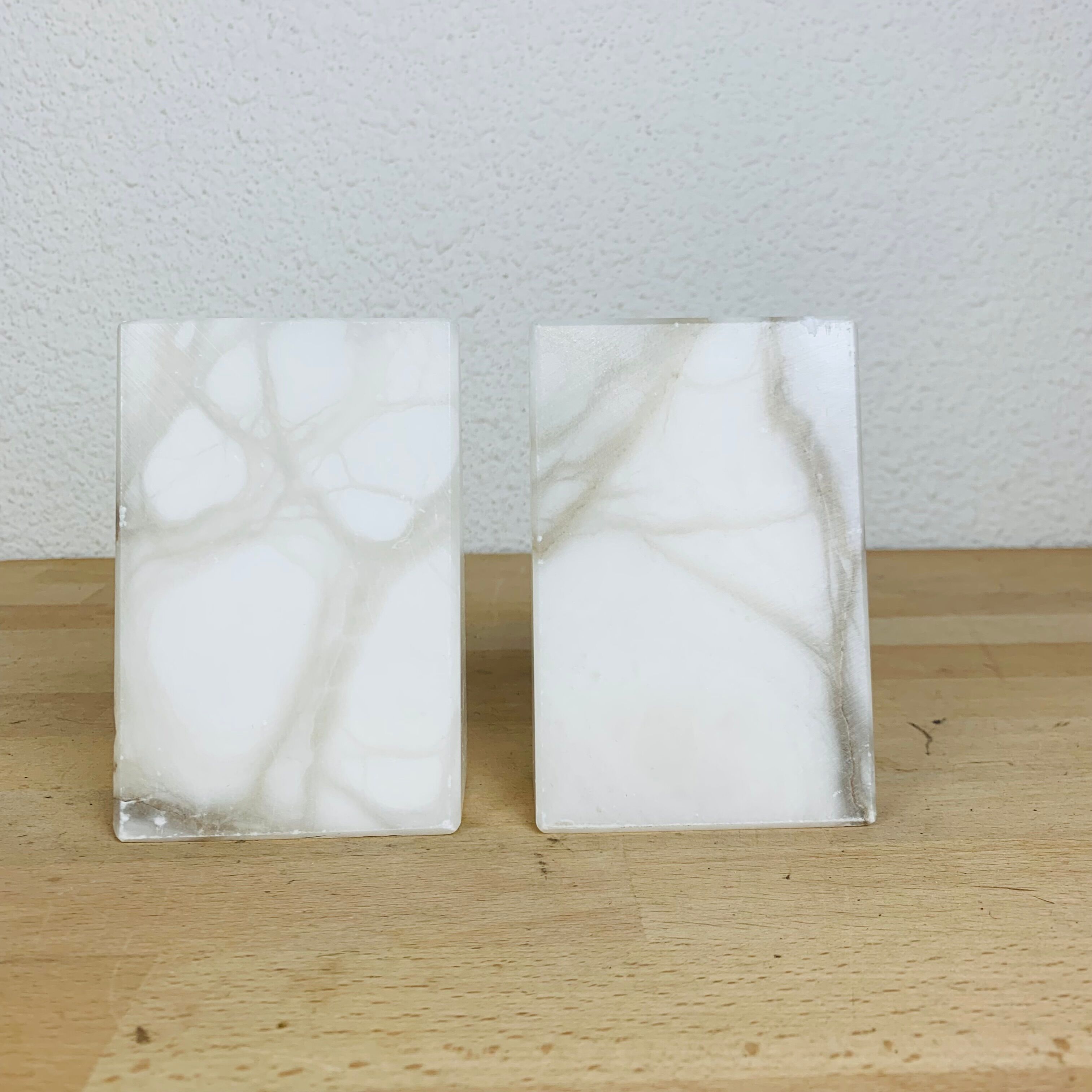 Pair of book greenhouses in alabaster white marble