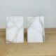 Pair of book greenhouses in alabaster white marble