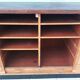 Workshop furniture with drawers and curtain in beech and walnut.