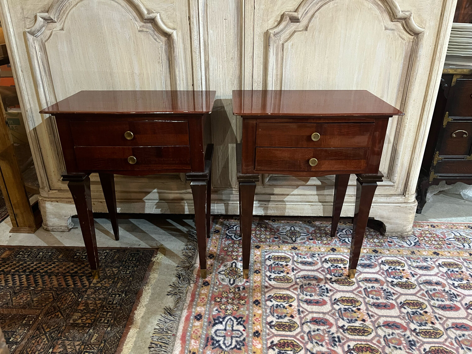 Pair of varnished mahogany bedside tables
