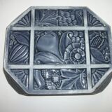 Enameled cast iron trivet. Art Deco