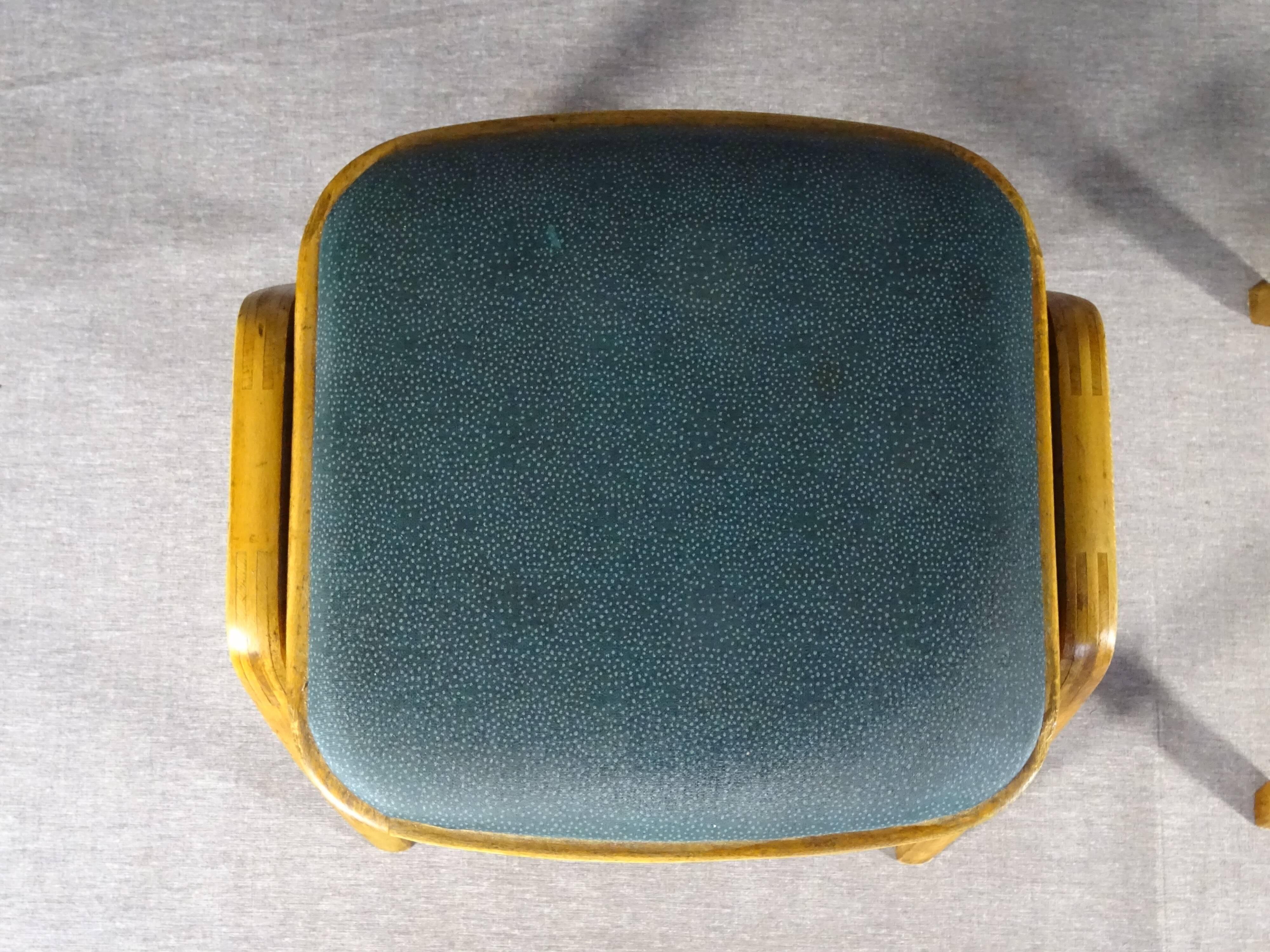2 Mid-century green vinyl stools with compass legs from the 1960s.