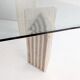 Dining table in travertine and glass with sculpted legs, 1970s.
