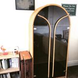 Curved bamboo and blond rattan library