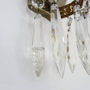 Pair of vintage bronze basket wall lights with glass pendants. The 50's