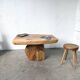 Organic brutalist coffee table in solid cedar, trunk pedestal, 1970s.